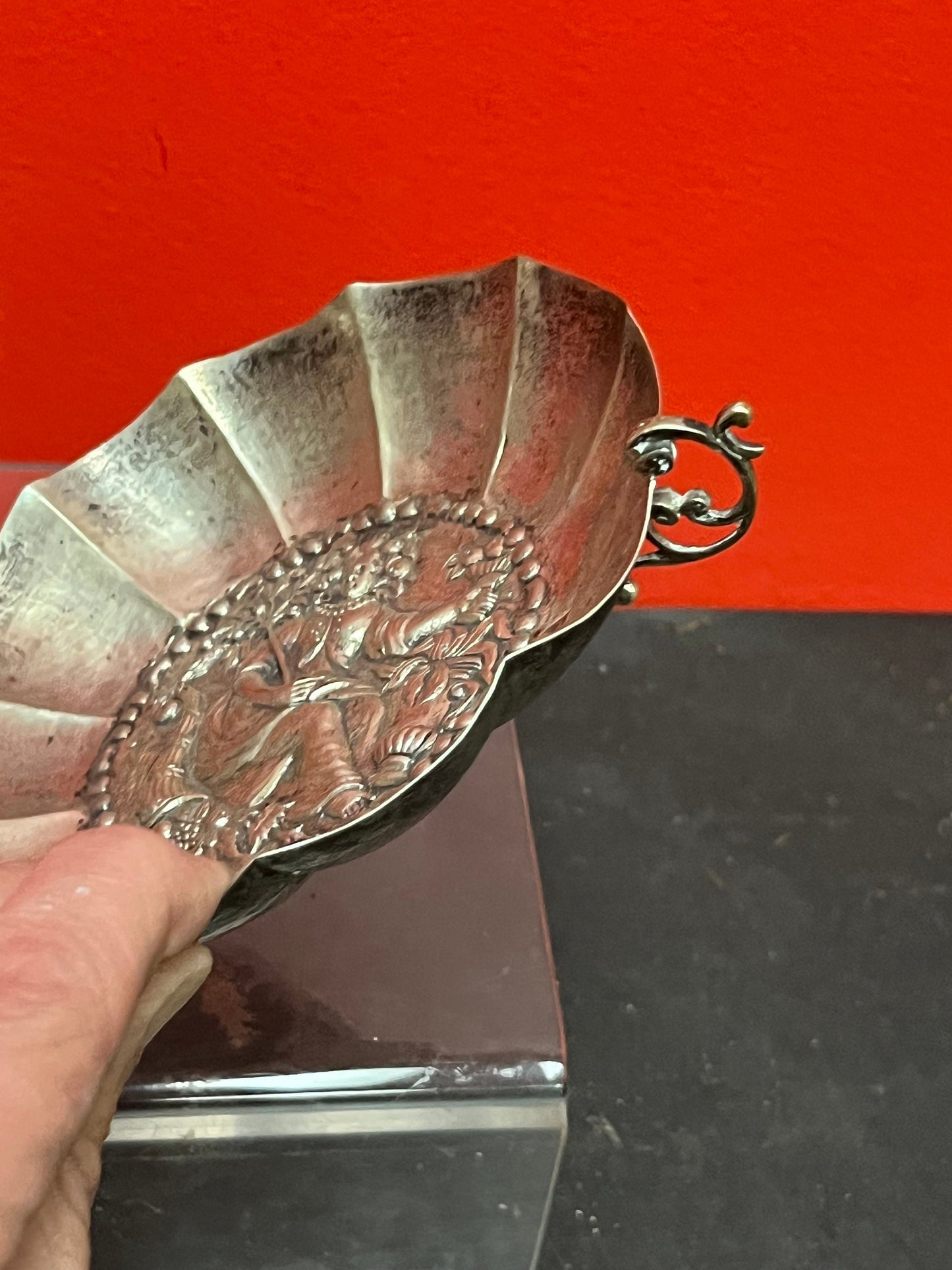 A  Persian silver bowl   7 inches and untested  great imagery and needs a polish