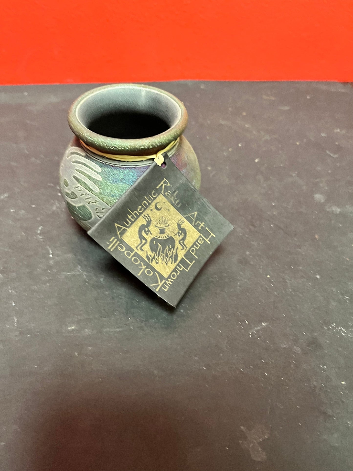 Lovely vintage Navajo Kokopelli signed handmade pottery vase with the original tag  perfect condition