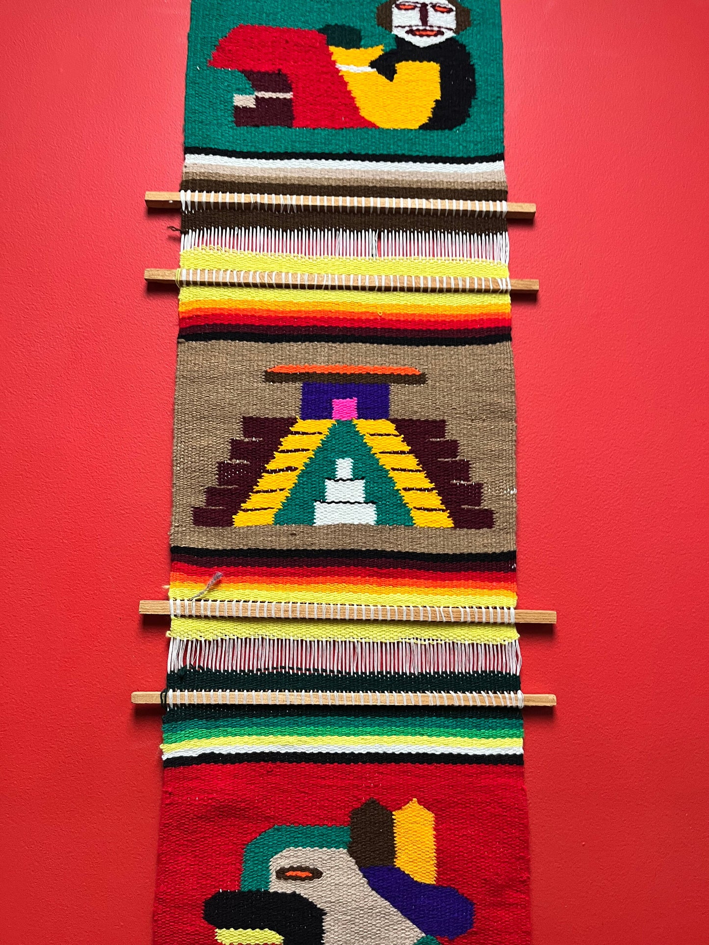 A  vintage wool  South American Aztec imagery - approximate 48 x 14  - wool handmade wall hanging   wow