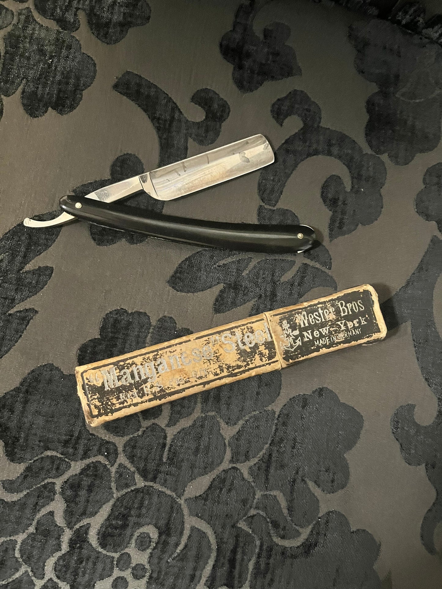 A 6 inch antique English razor in original box