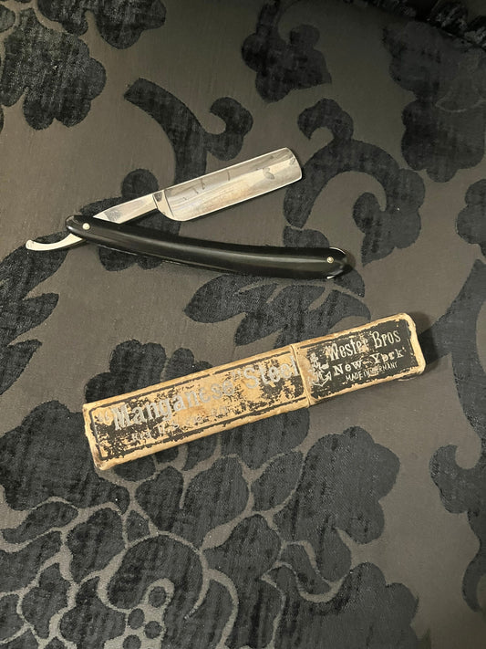 A 6 inch antique English razor in original box