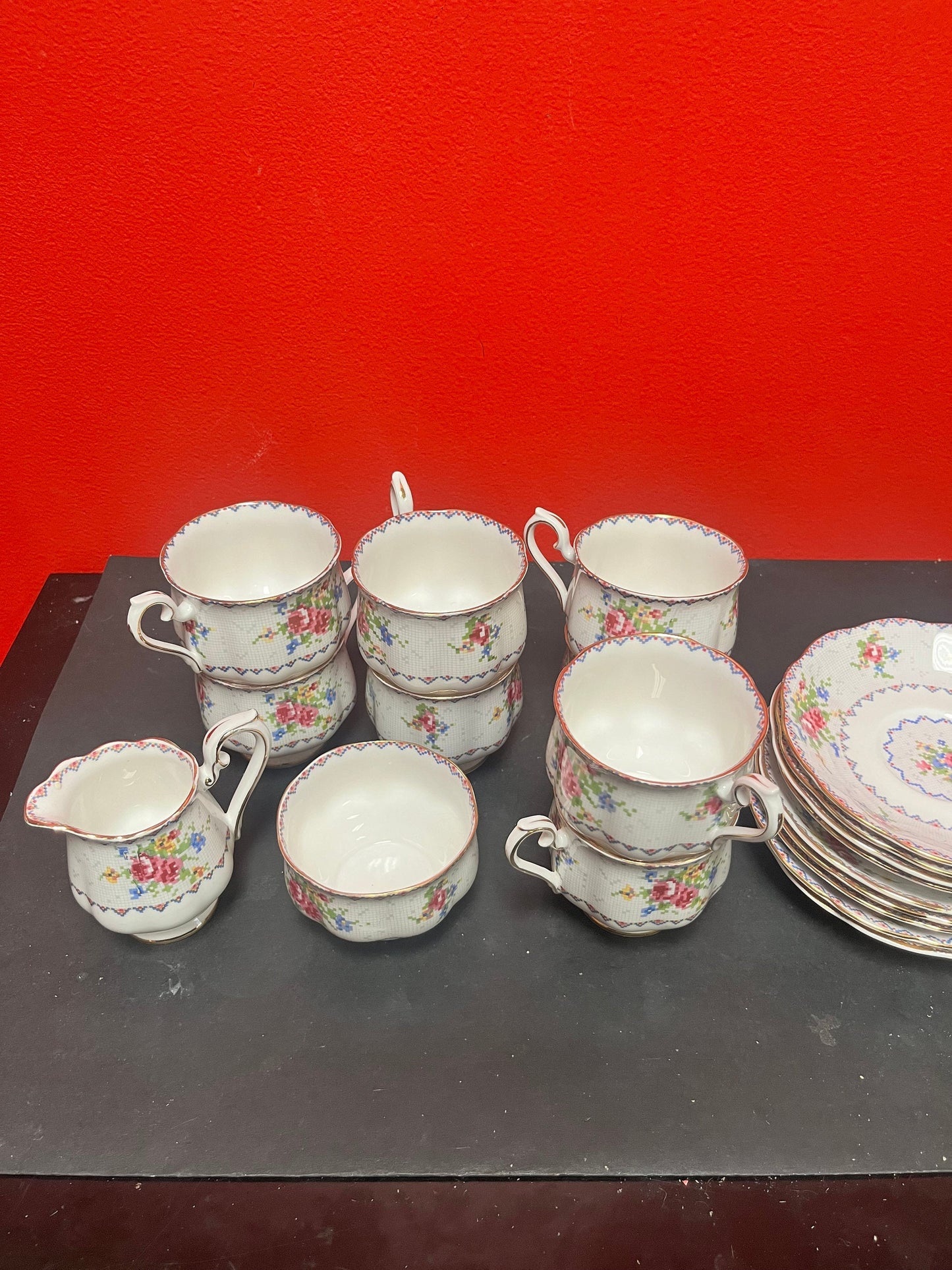 8 Royal Albert petit point China cup and saucers and a cream and sugar  perfect condition  good value  1 cup cracked