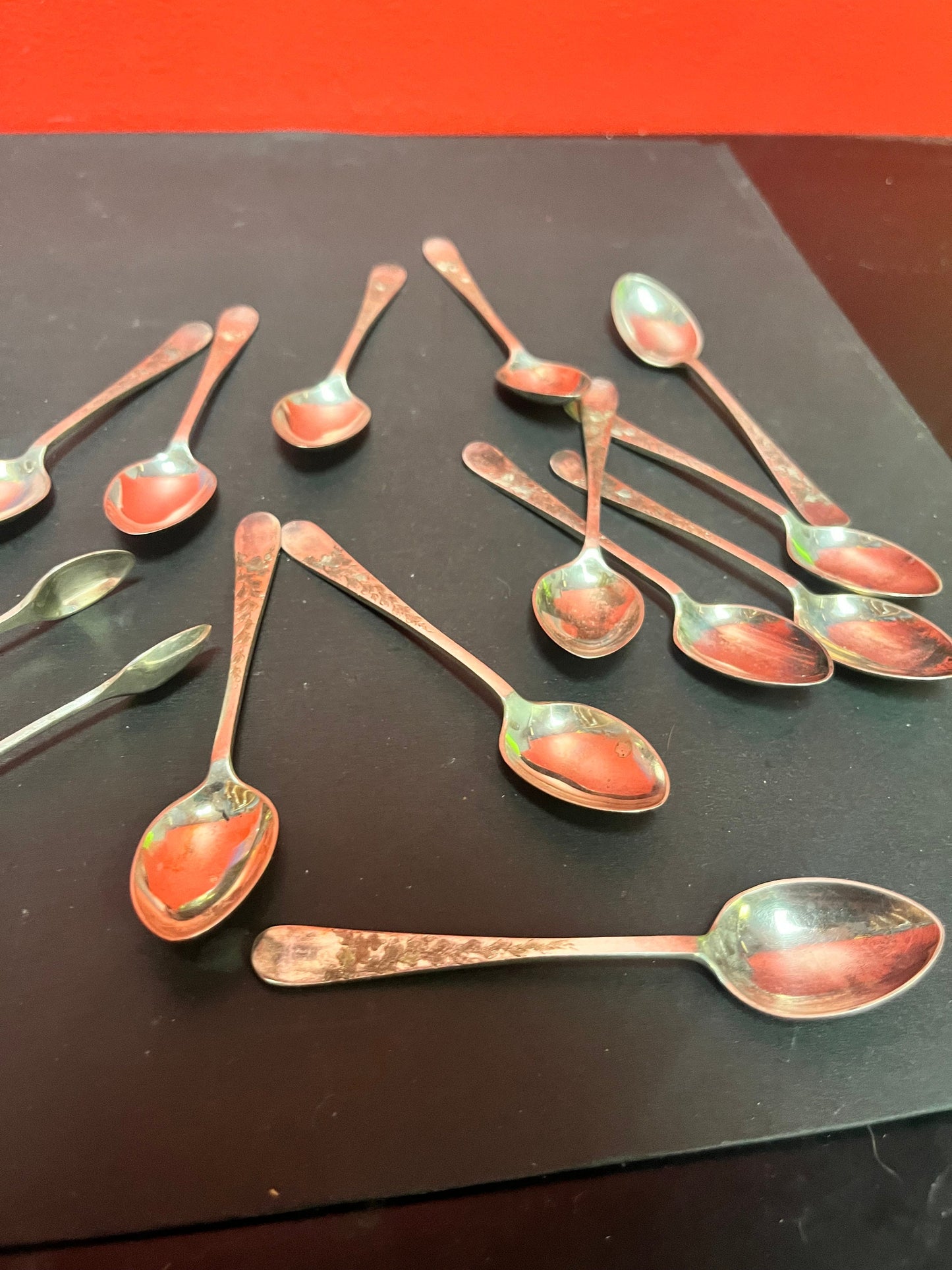 Set of 12 English sterling silver hallmarked teaspoons and sugar tongs  pretty design and needs a quick polish  great value