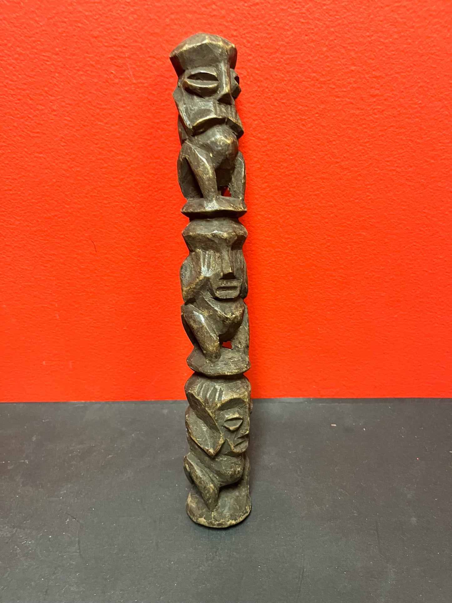 A  12 inch antique carved African wood statue of the no evils  great detail and needs assistance to stand good value