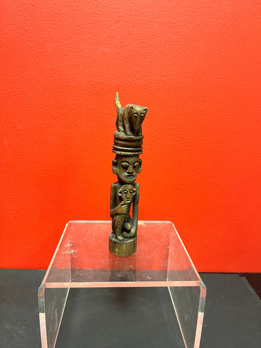 A  Seriously ancient 7 inch African statue with great imagery   good condition for age and amazing detail