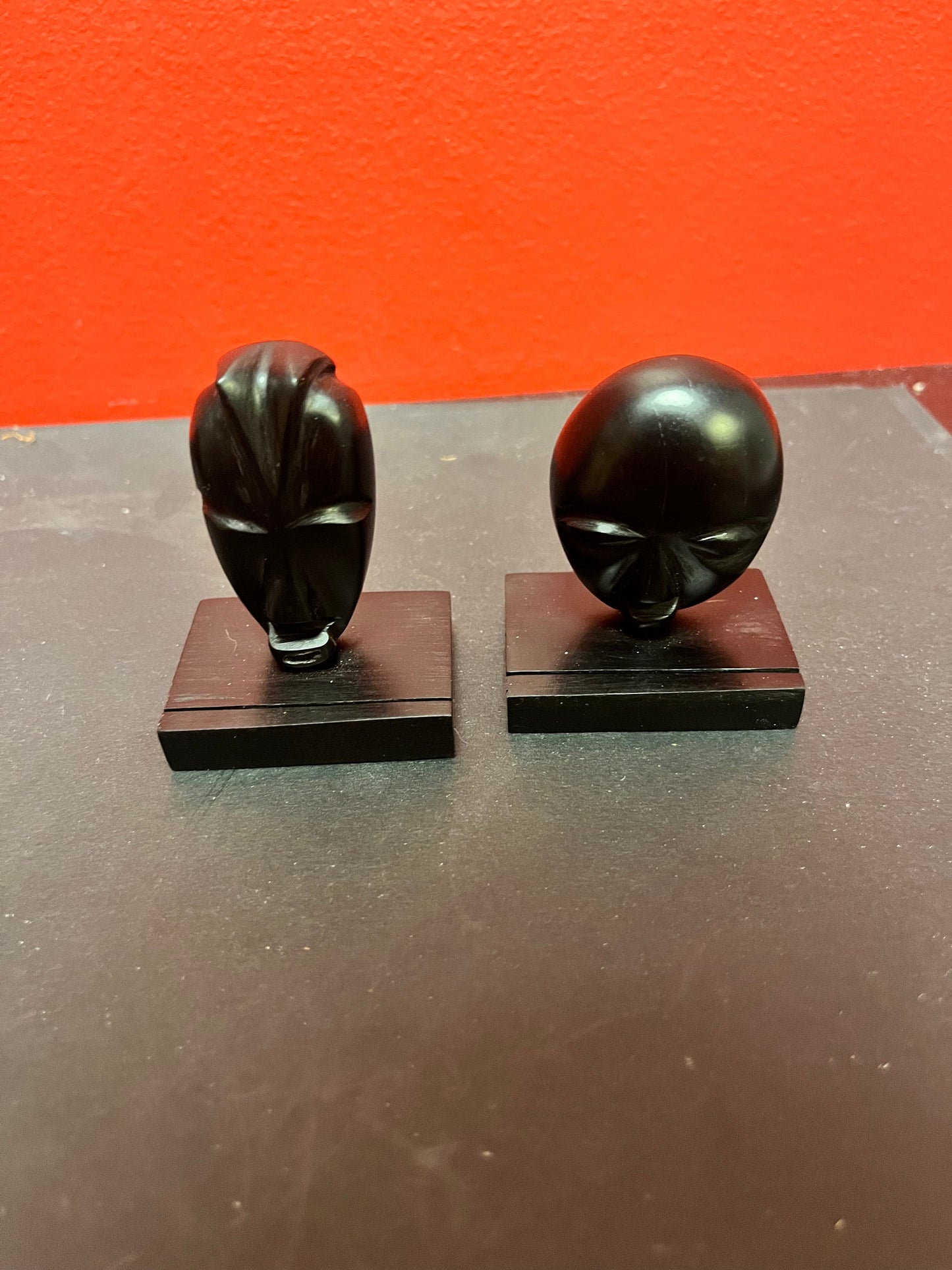 Two fabulous Ebony wood  African masks on stands  3 inches high  great quality and detail  prices for both