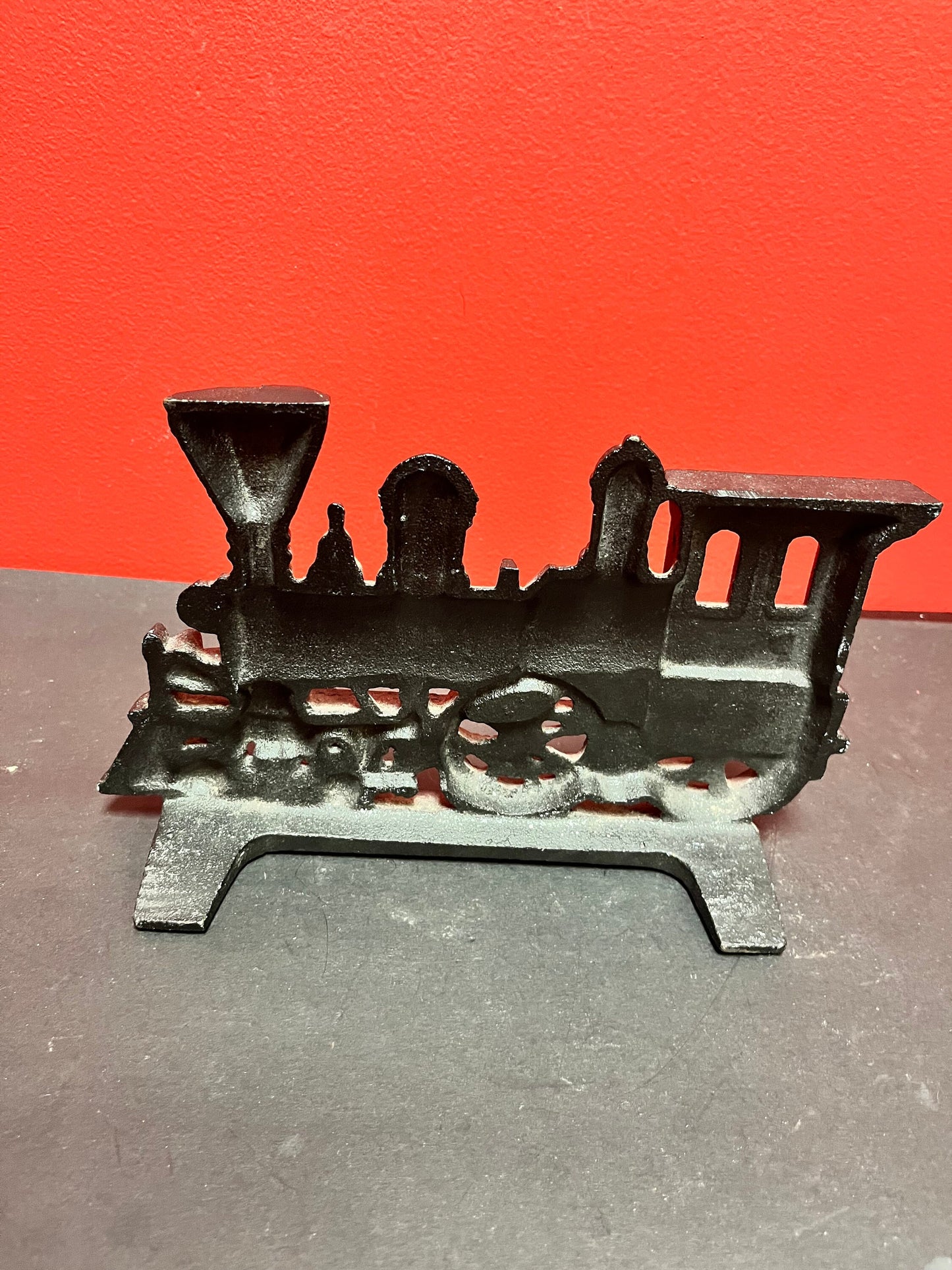 A  10 x 6 high old cast-iron train doorstop  amazing detail, and heavy quality - perfect gift  Choo Choo choose  this one