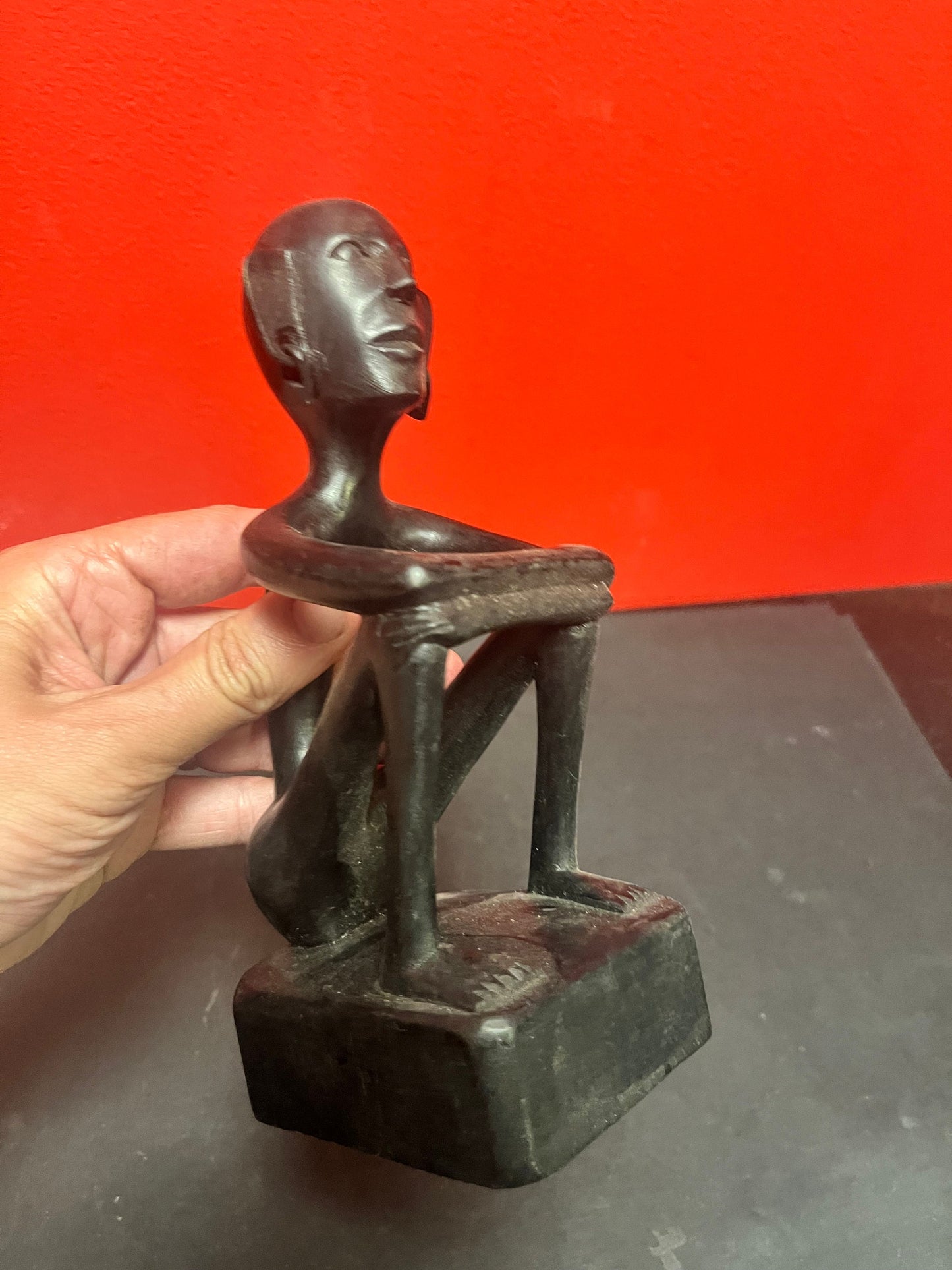 8 inch African statue of a thinking man  with earrings  unique and cool