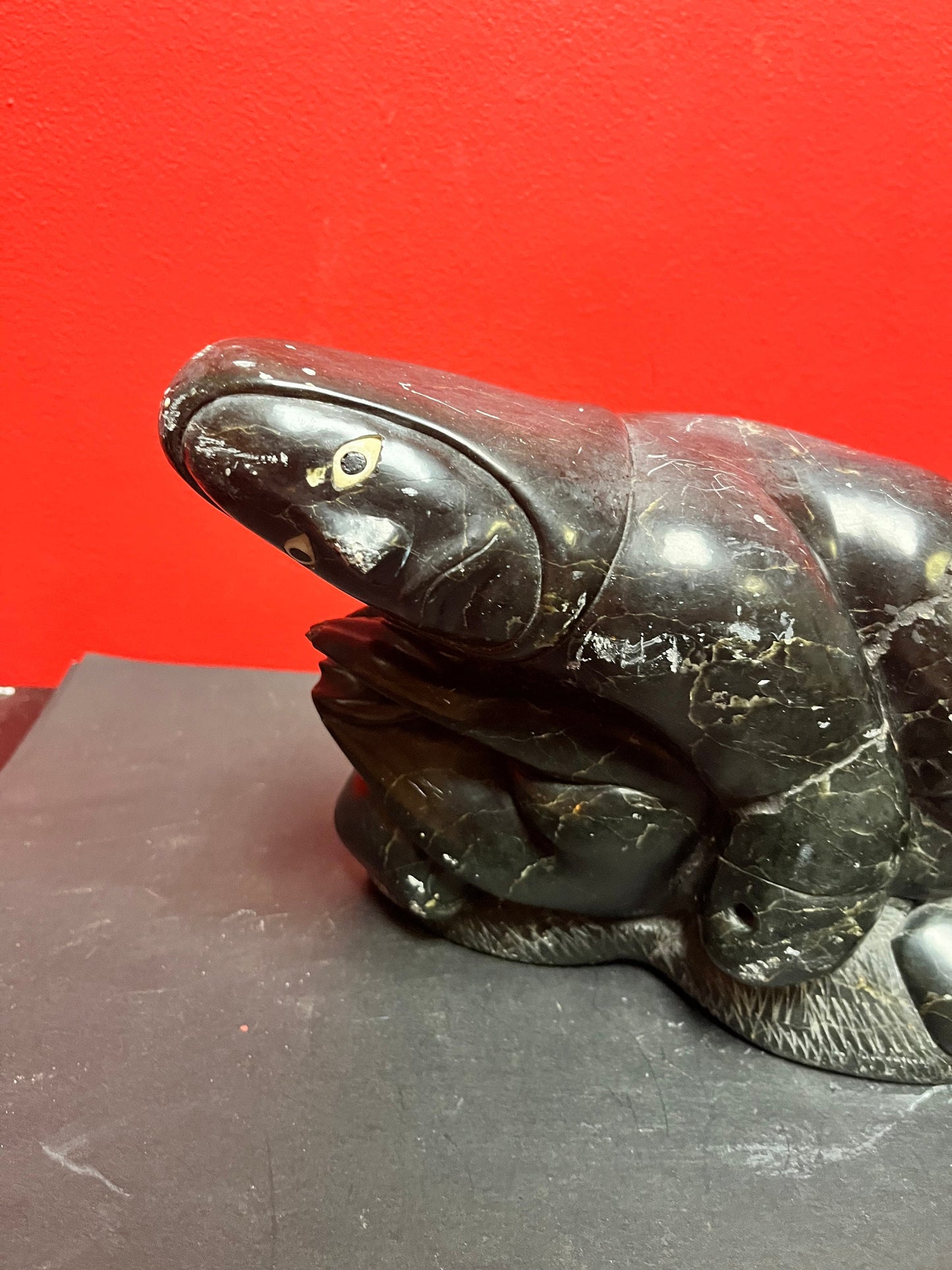 Fabulous signed authentic Canadian Eskimo soapstone Hunter versus seal   16 x 7 high with some minor scratches  approx 6 plus kilos