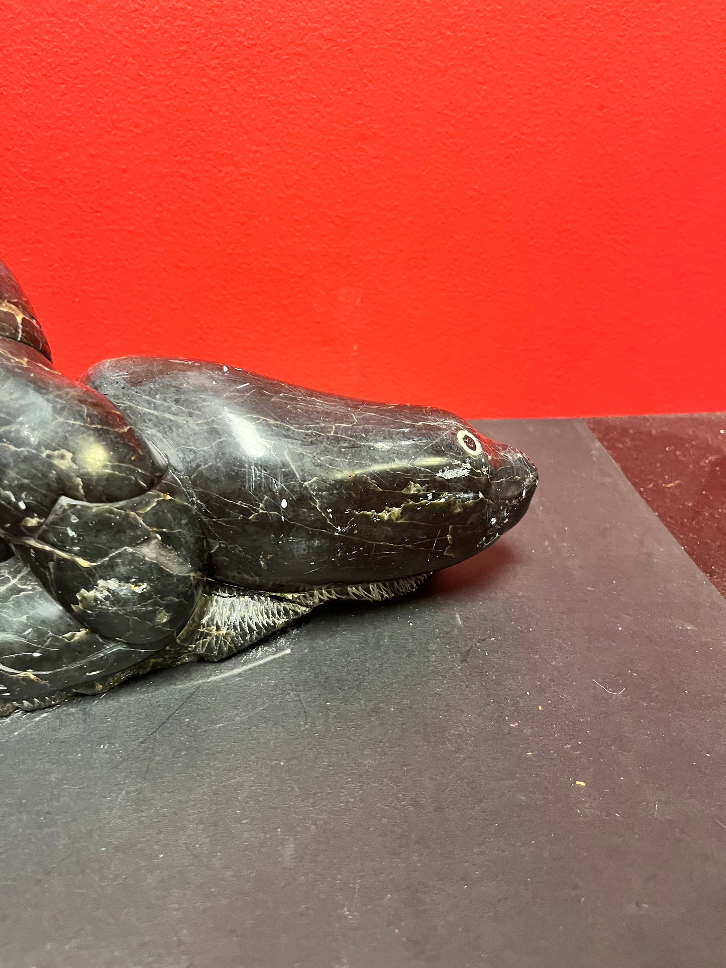 Fabulous signed authentic Canadian Eskimo soapstone Hunter versus seal   16 x 7 high with some minor scratches  approx 6 plus kilos