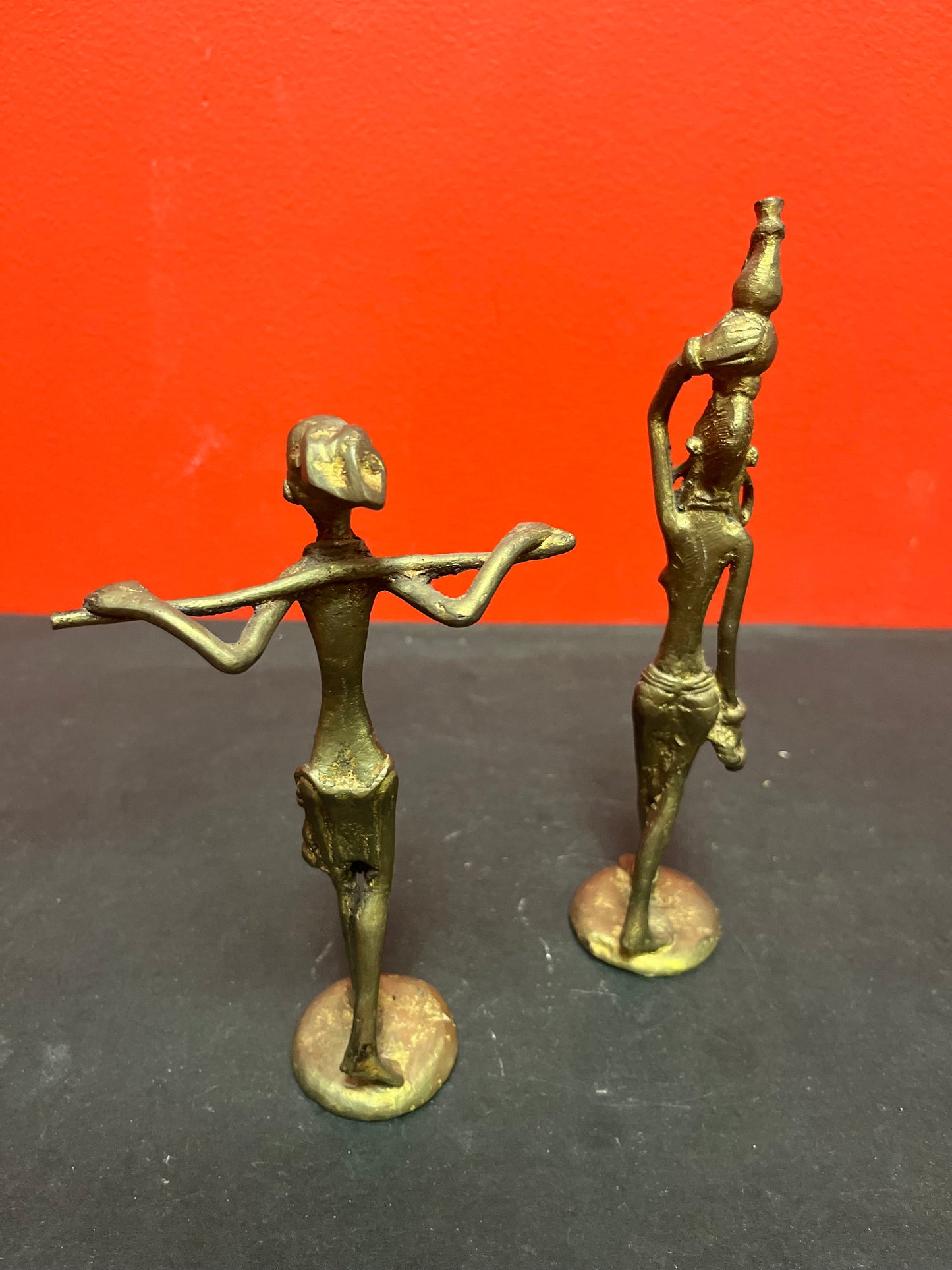 Two lovely old African Ashanti bronze statues   great patina and wonderful detail seven and 8 inches tall