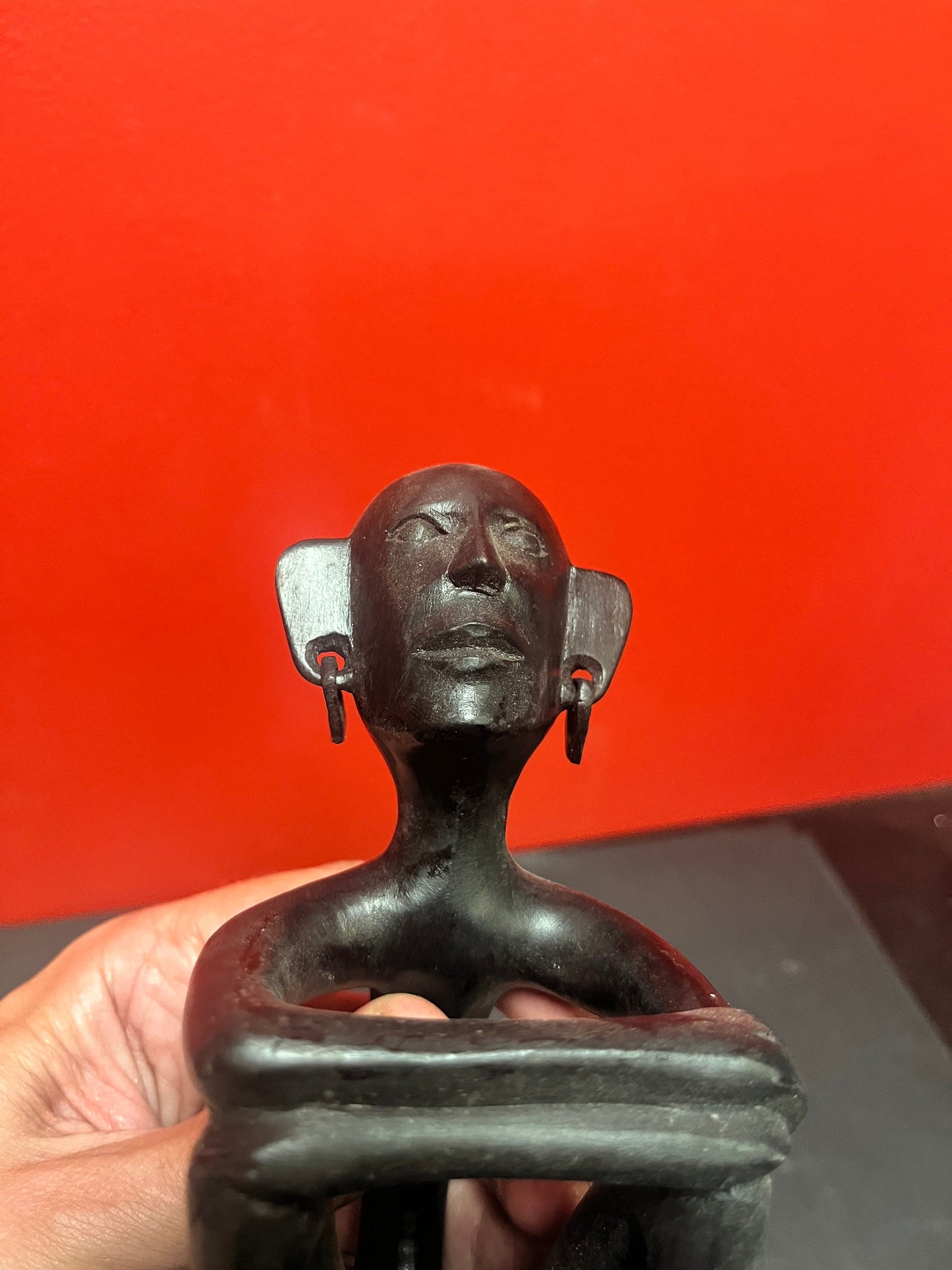 8 inch African statue of a thinking man  with earrings  unique and cool