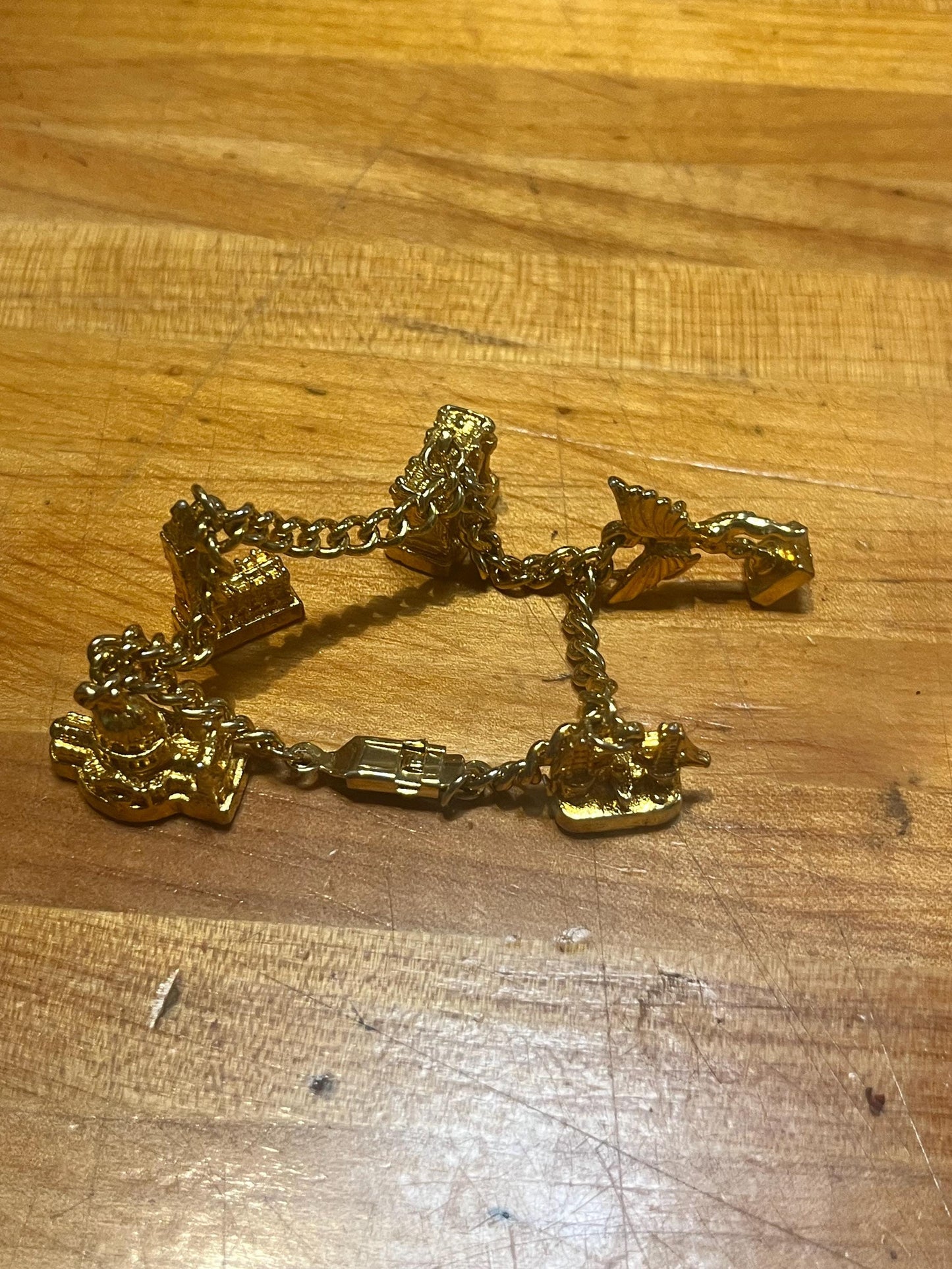 5 gold charms  not tested  intense value