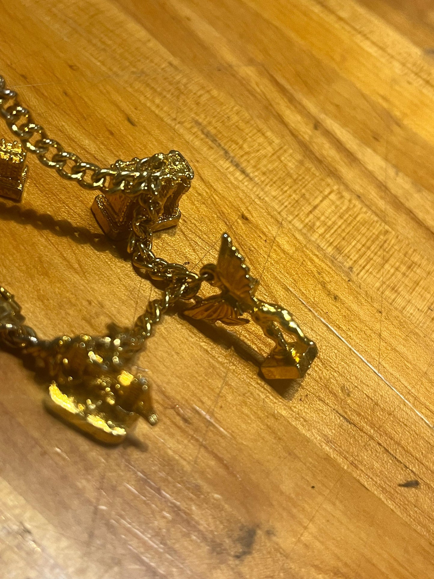 5 gold charms  not tested  intense value