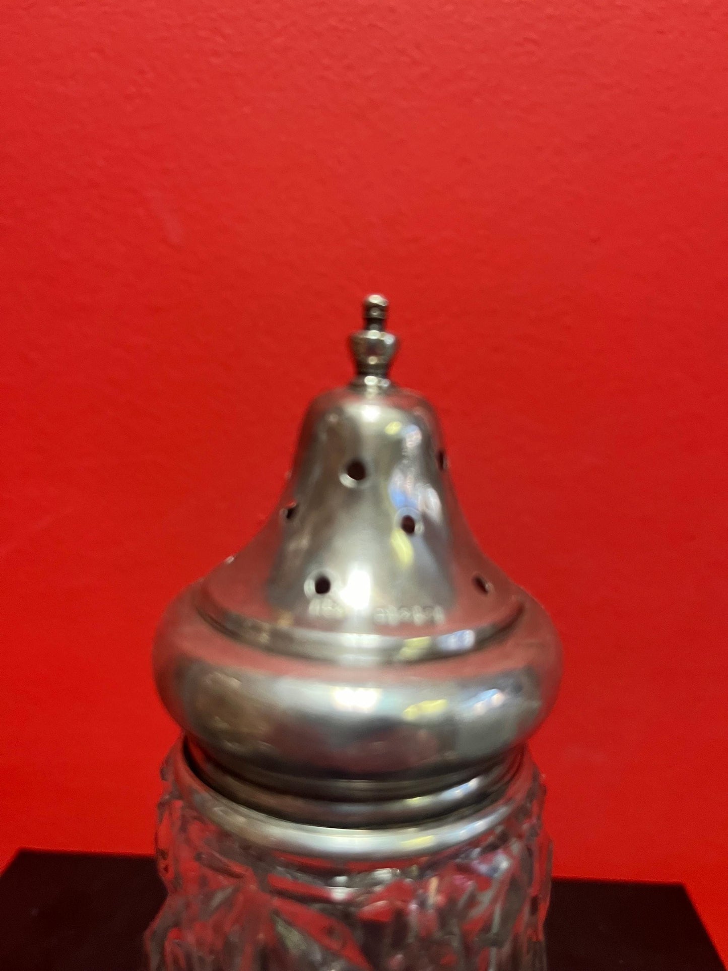 Lovely English sterling topped crystal sugar shaker   Good Hallmarks and sits 6 inches  inches high  Lovely piece