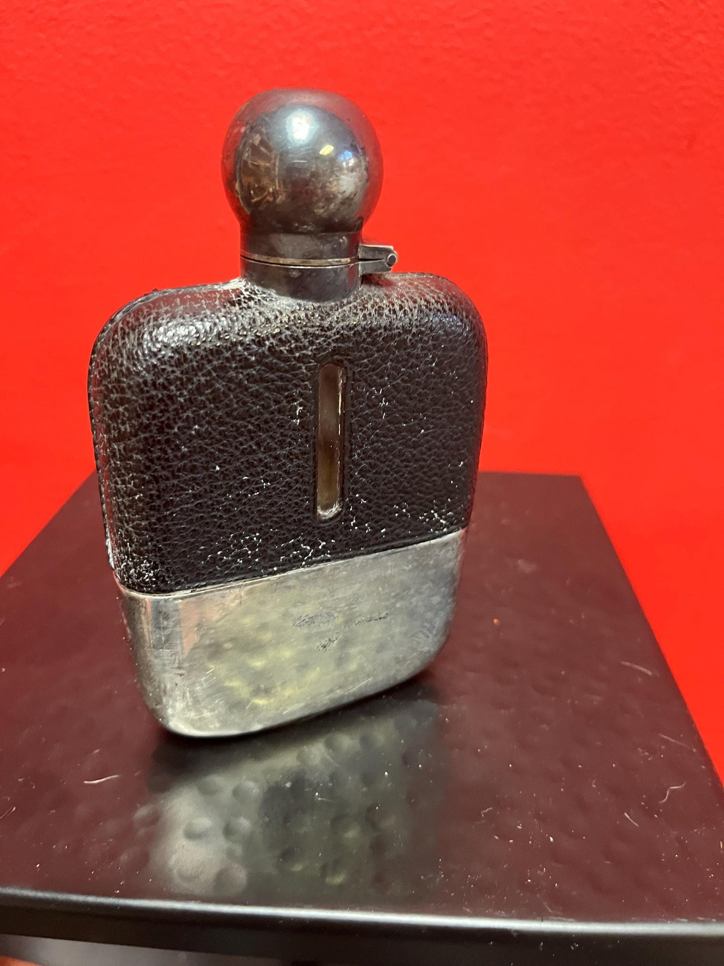 Handsome  5 inch tall leather and silver plated and glass antique English flask  good condition  needs a polish and great gift