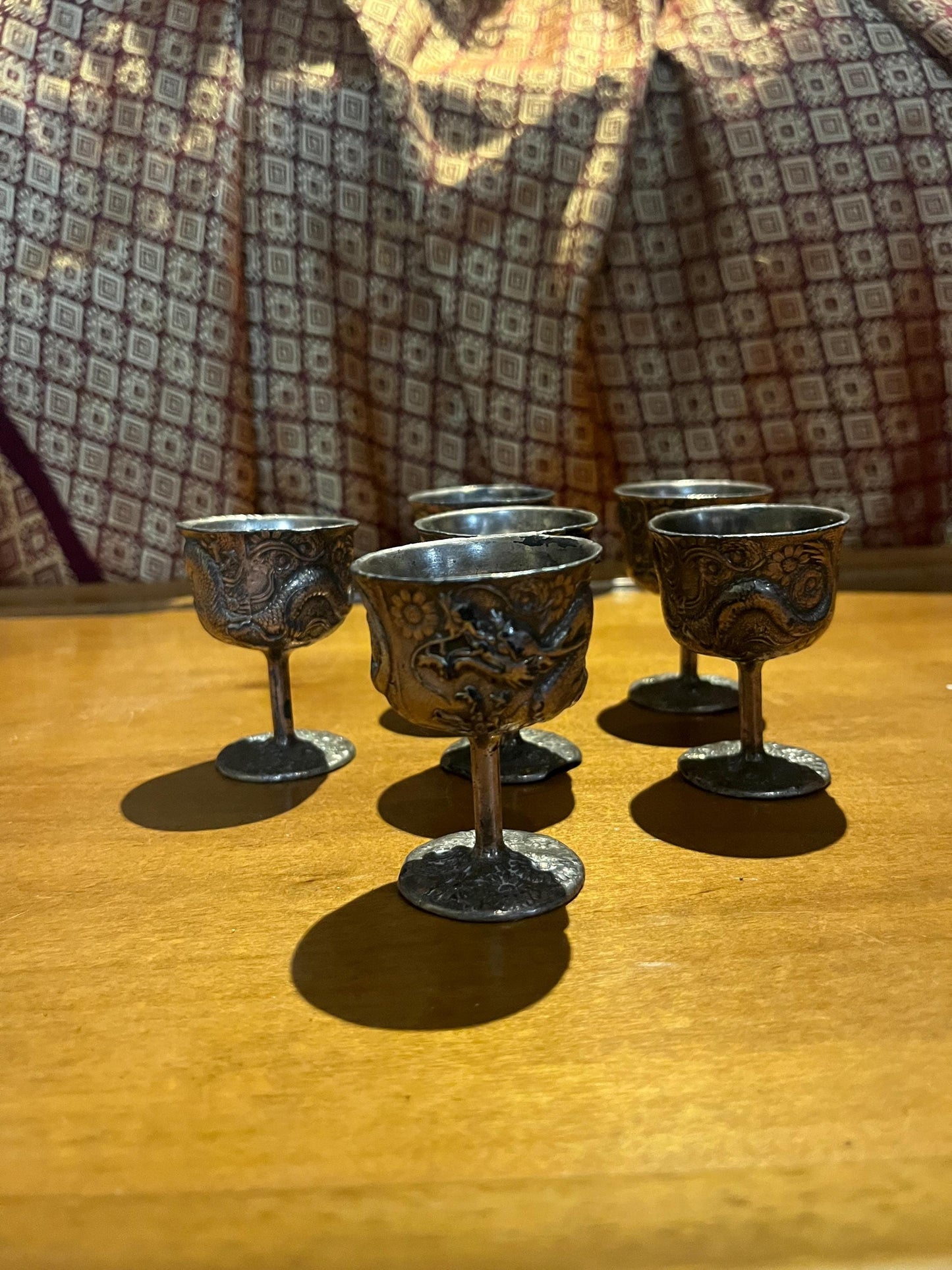 Set of six Chinese silver untested dragon cups   2 1/2 inches tall  great value  Chinese dragons should rule the world