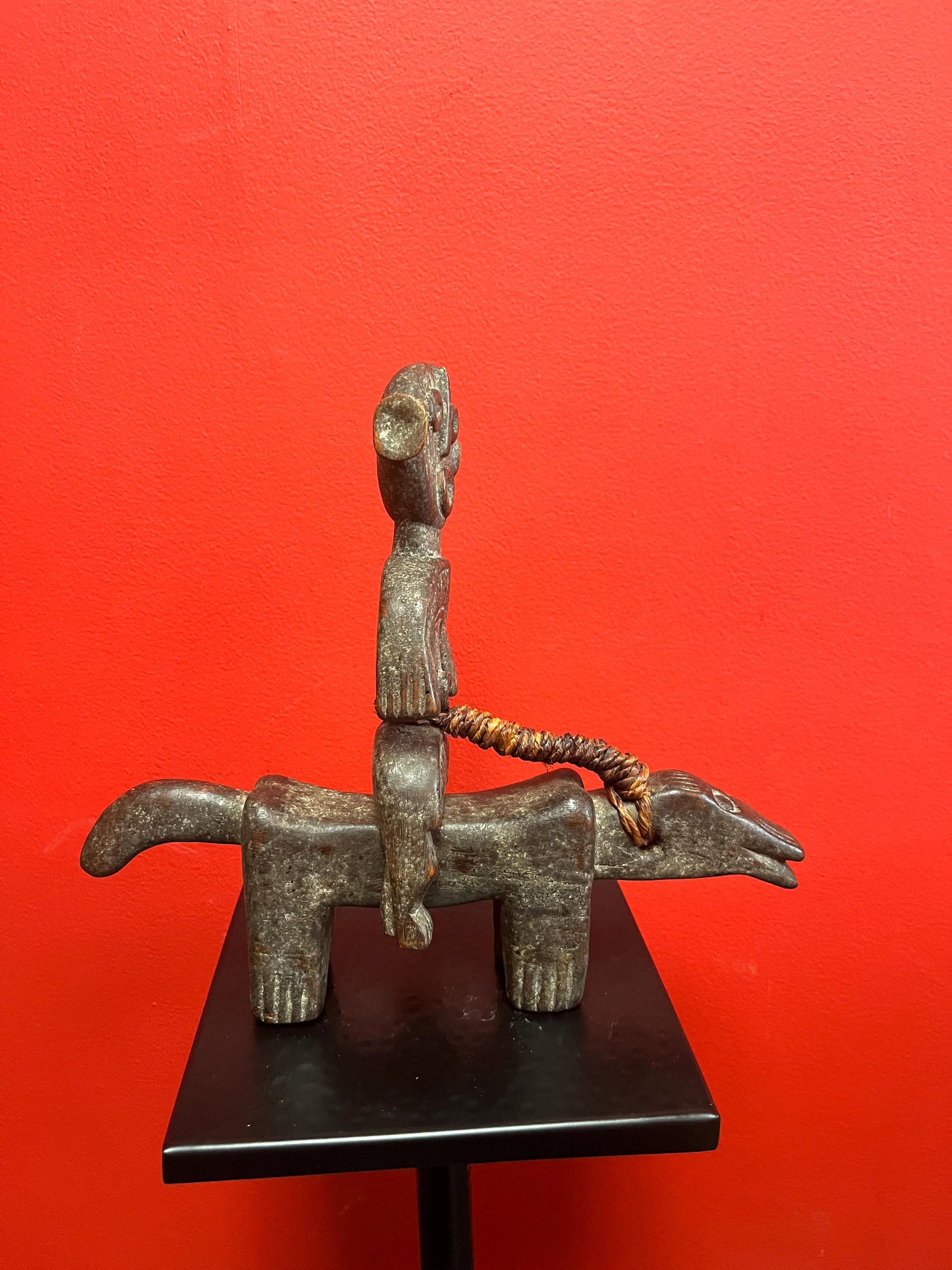 Rare beautiful African 10 x 10 inch antique statue of a man riding an animal  great patina and unusual imagery