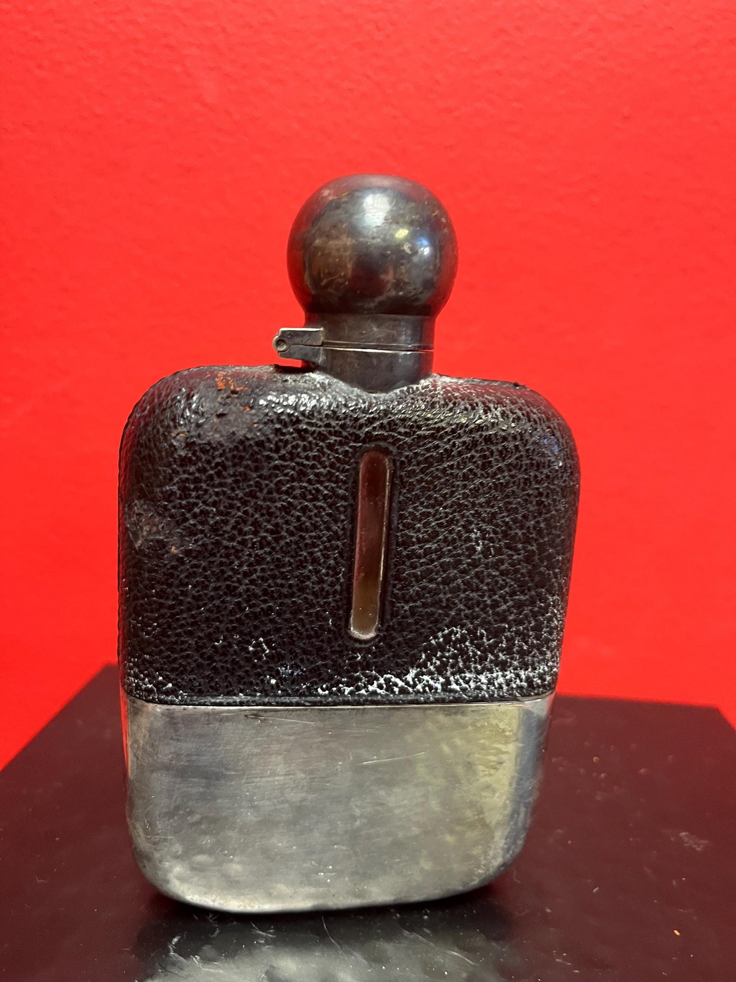 Handsome  5 inch tall leather and silver plated and glass antique English flask  good condition  needs a polish and great gift