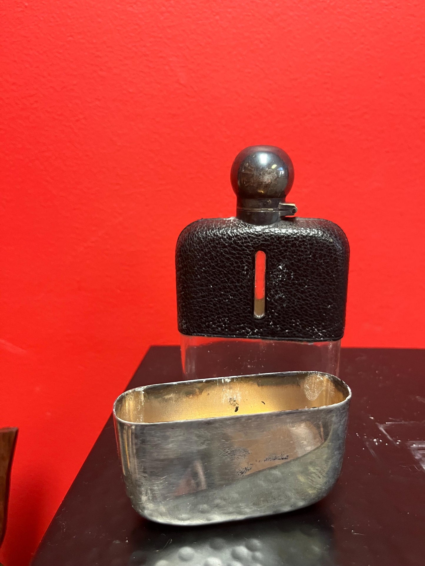 Handsome  5 inch tall leather and silver plated and glass antique English flask  good condition  needs a polish and great gift