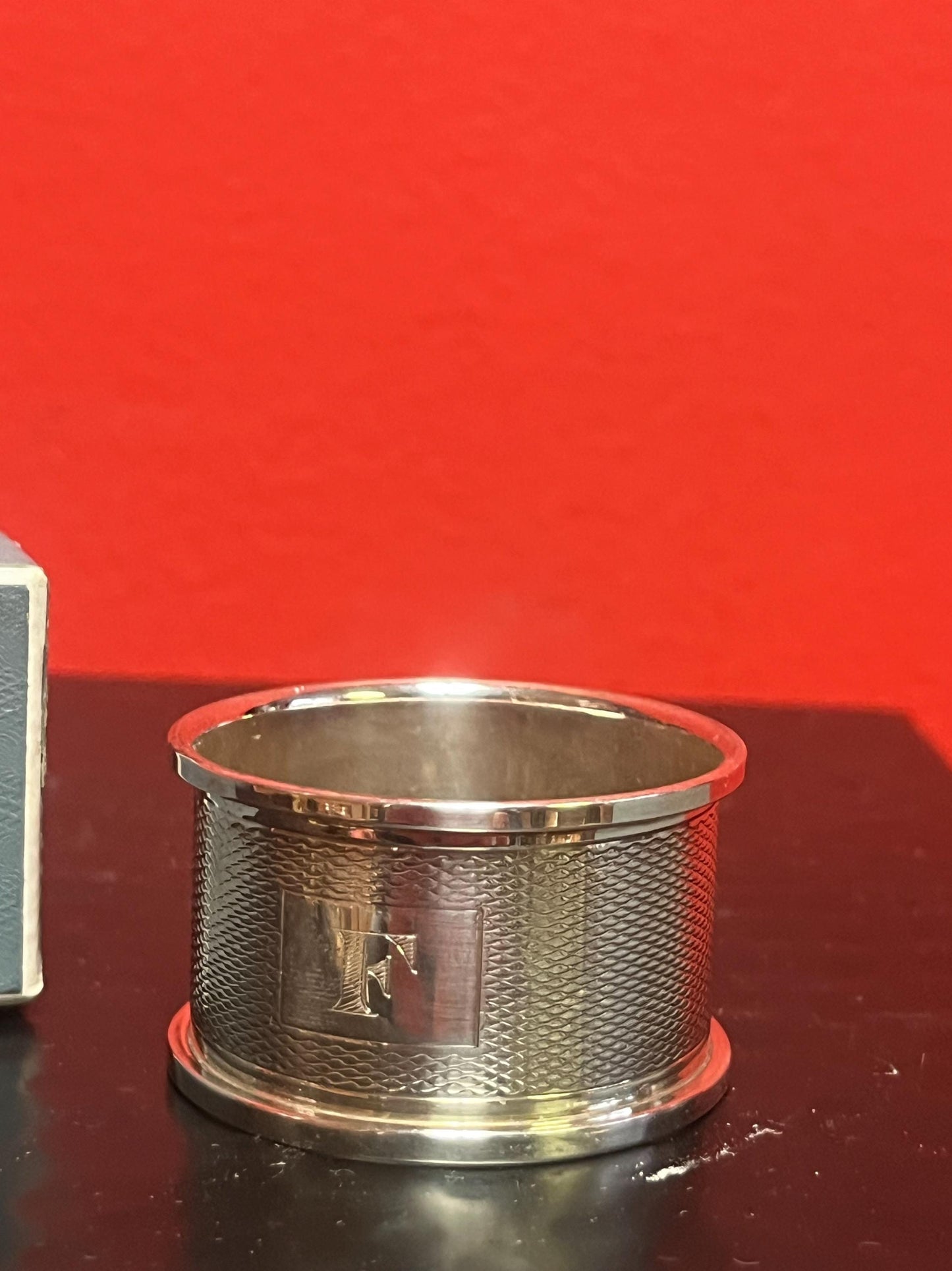 Lovely antique English hallmarked napkin ring with engine turning in original box monogrammed F 4 matching available  all mint condition