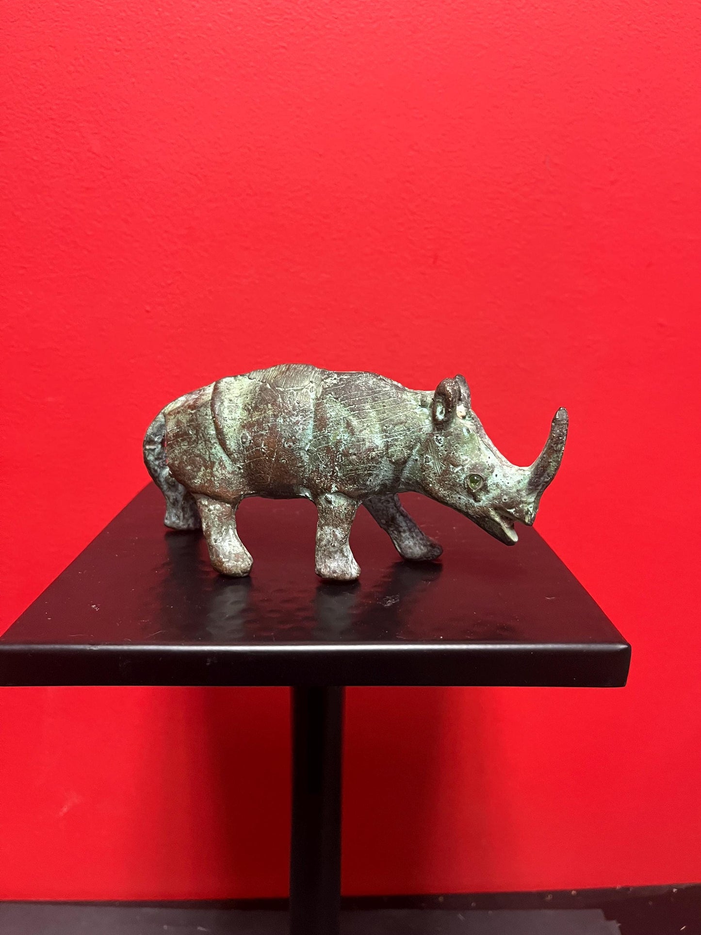 7 x 3 inch high antique Chinese bronze rhinoceros  great patina and amazing glass eyes  wow