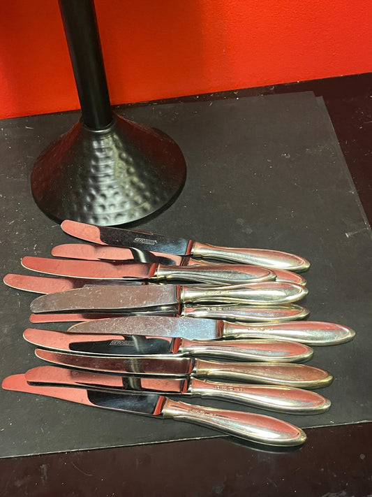 Gorgeous set of 11 silver plated German lunch knives  Great condition need polishing and 8 inches long   great value
