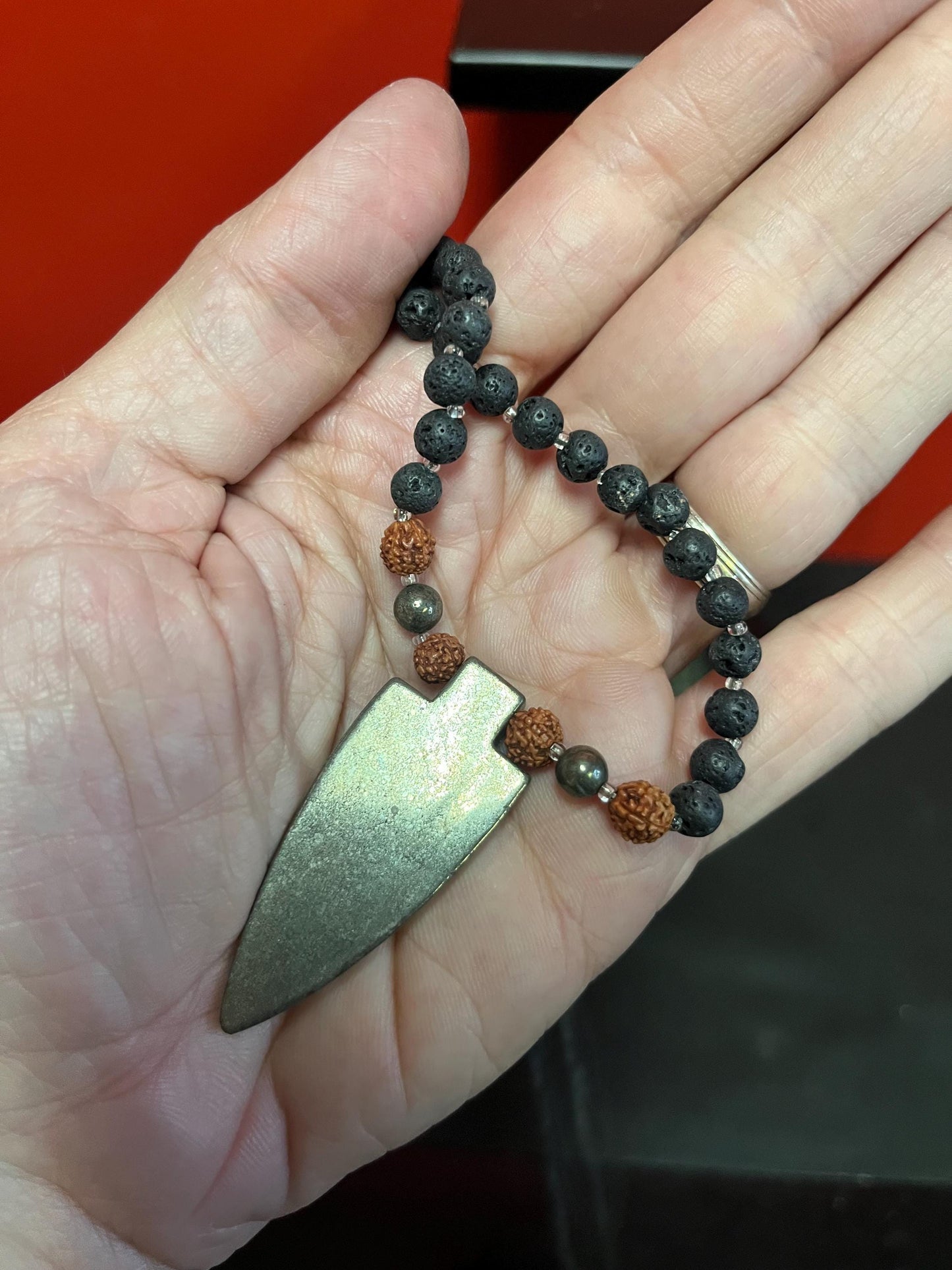 Very cool approximately 28 inch long petrified lava ? and stone necklace with very cool pendant  great value and perfect gift