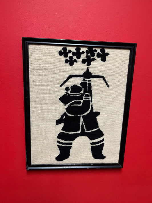 19 x 15 old woven needlepoint picture of an Eskimo  hunting in frame   great imagery and condition  unusual