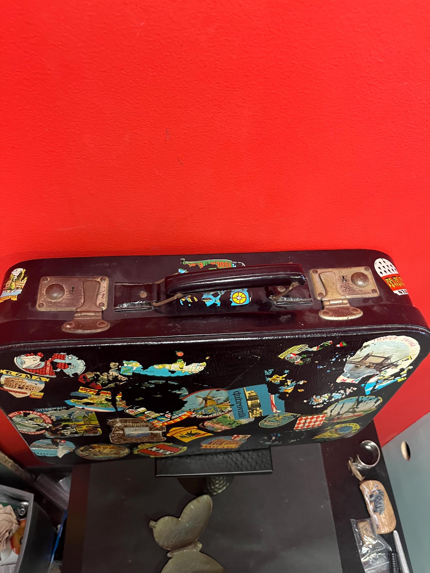 One of a kind 1920s  21 x 16 x 5 deep travel suitcase with the original stickers   amazing for use or decoration  wow