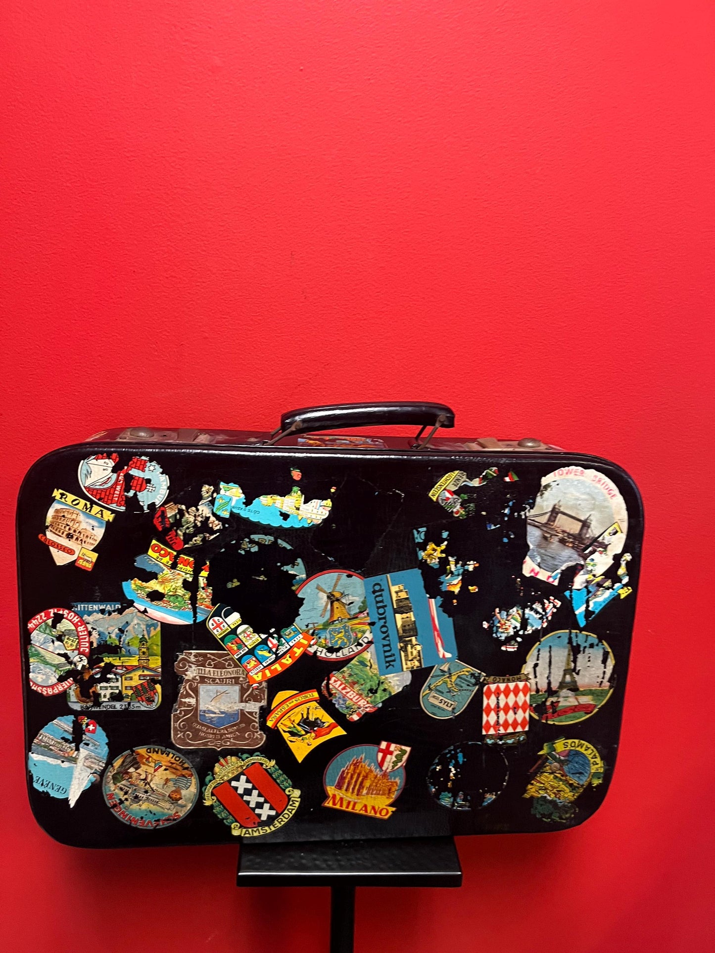 One of a kind 1920s  21 x 16 x 5 deep travel suitcase with the original stickers   amazing for use or decoration  wow