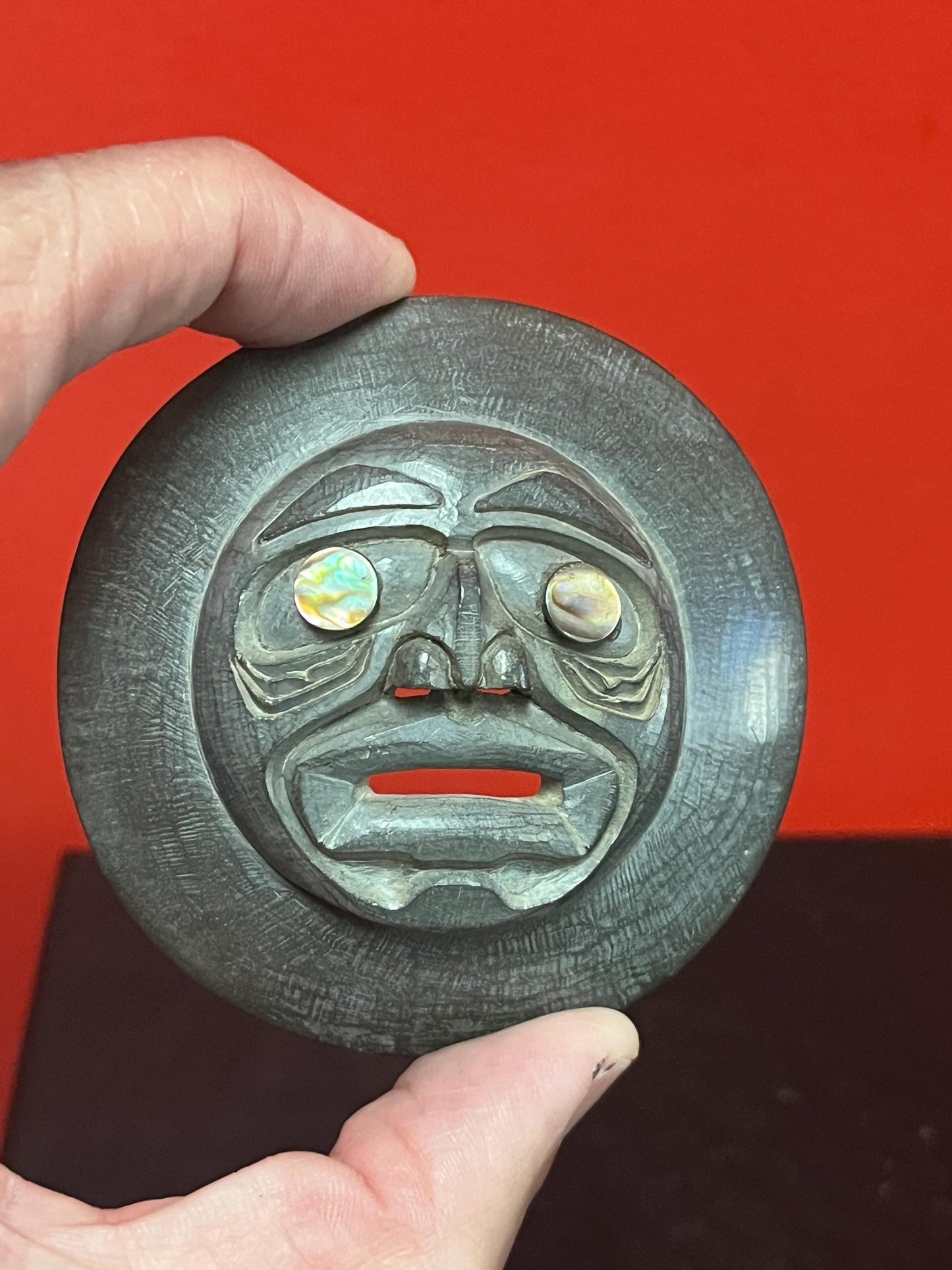 3 inch stunning argillite moon mask with abalone eyes  wonderful condition and amazing imagery!