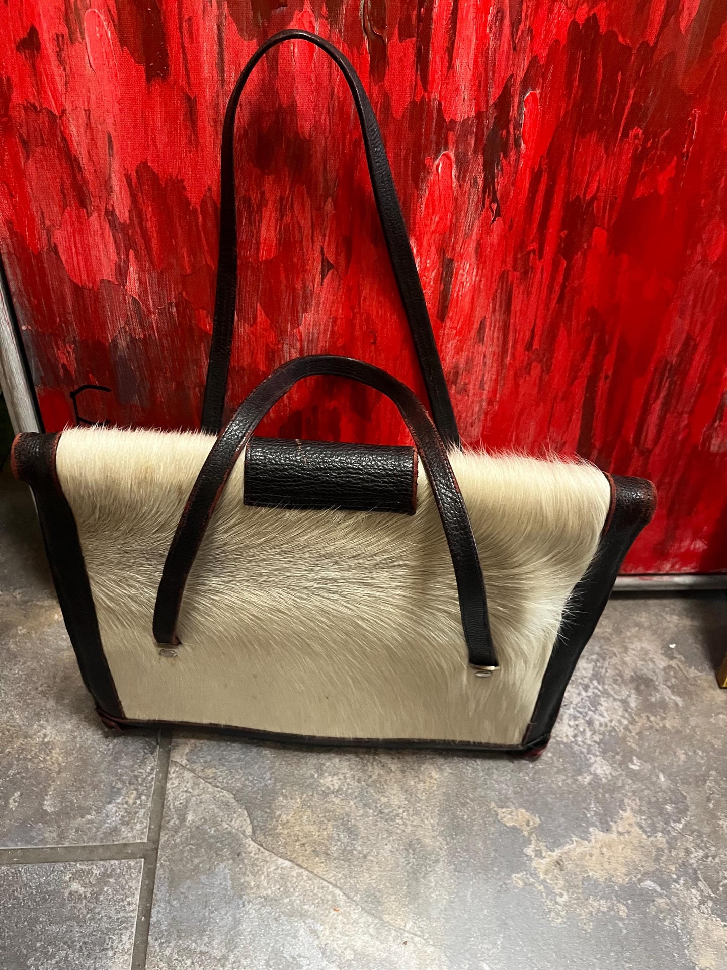 17 x 12 x 3 thick fabulous vintage cowhide and leather handbag with butterfly latch  great condition for age  great to use or gift  wow