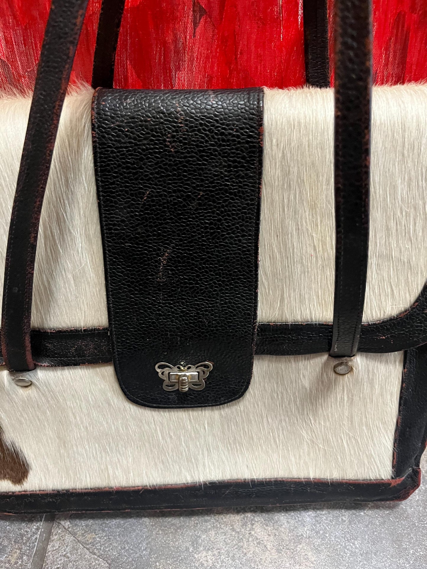 17 x 12 x 3 thick fabulous vintage cowhide and leather handbag with butterfly latch  great condition for age  great to use or gift  wow