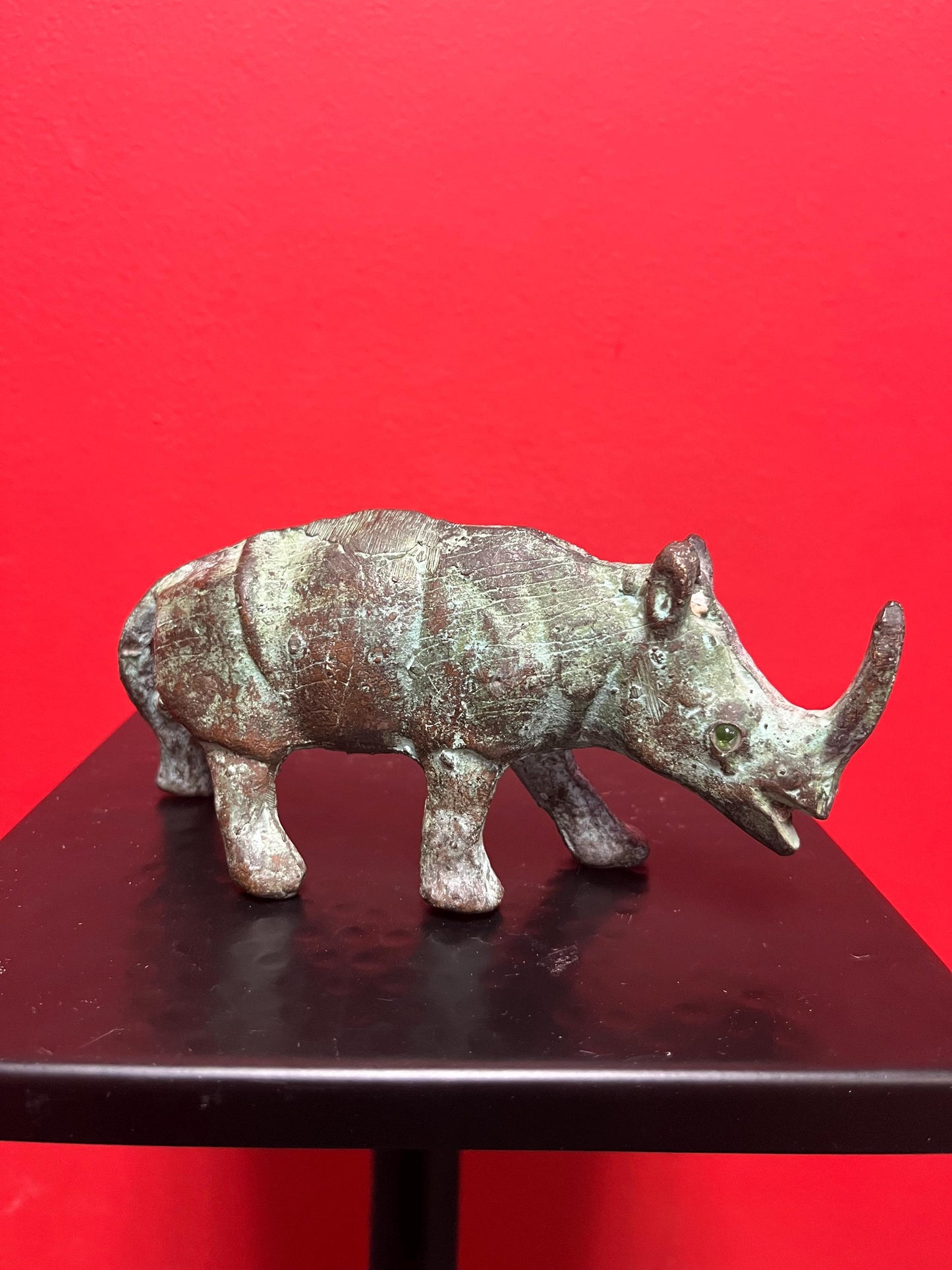 7 x 3 inch high antique Chinese bronze rhinoceros  great patina and amazing glass eyes  wow