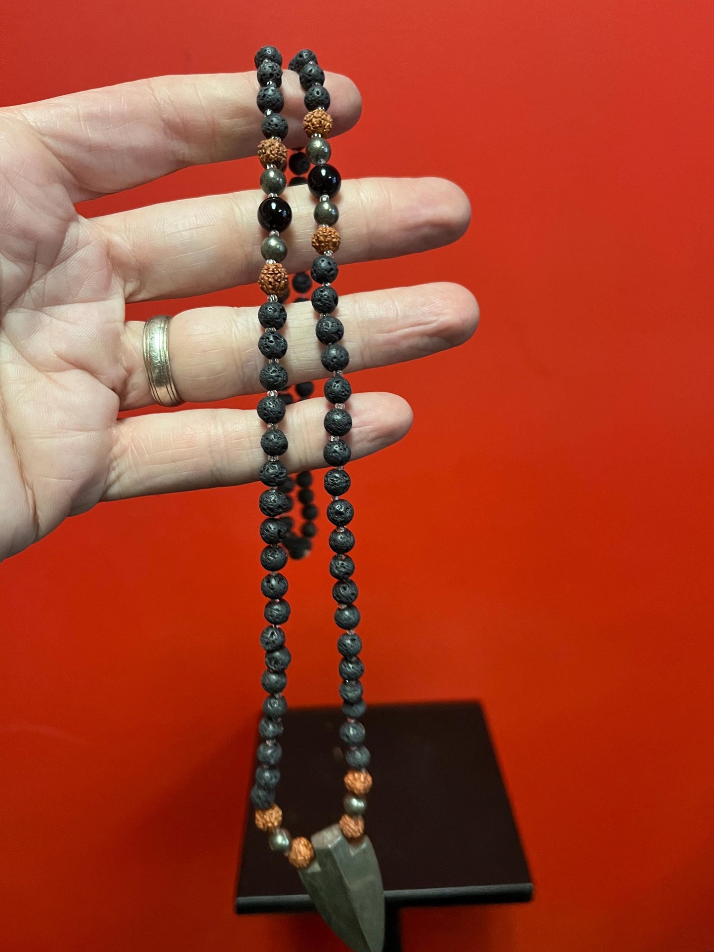 Very cool approximately 28 inch long petrified lava ? and stone necklace with very cool pendant  great value and perfect gift