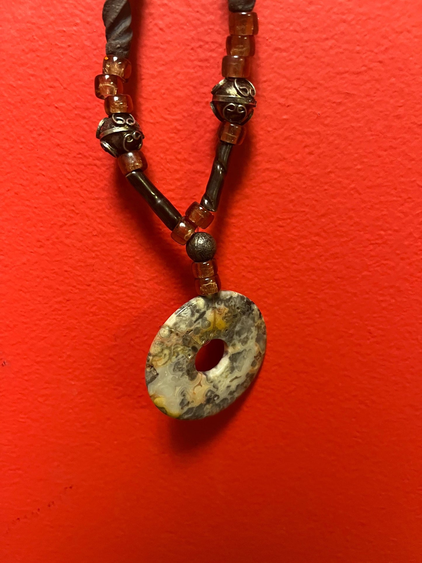 Approximately 26 inch long stone, beads and wood necklace  very funky and beautiful  great gift -