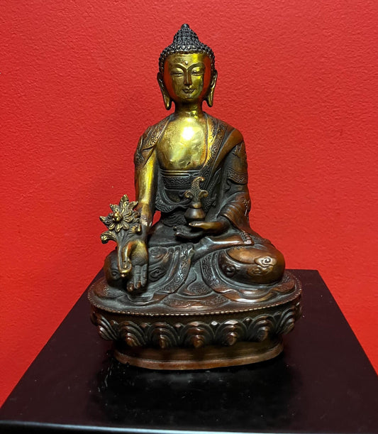 Beautiful Asian bronze Buddha with lovely gilding  8 1/2 inches tall age unknown  wonderful quality and great price