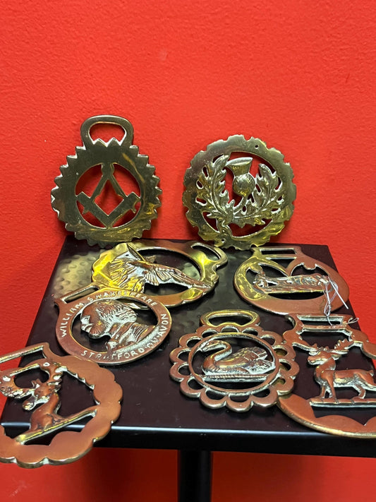 Lovely group of  antique horse brasses  particularly nice ones and eight included  wow