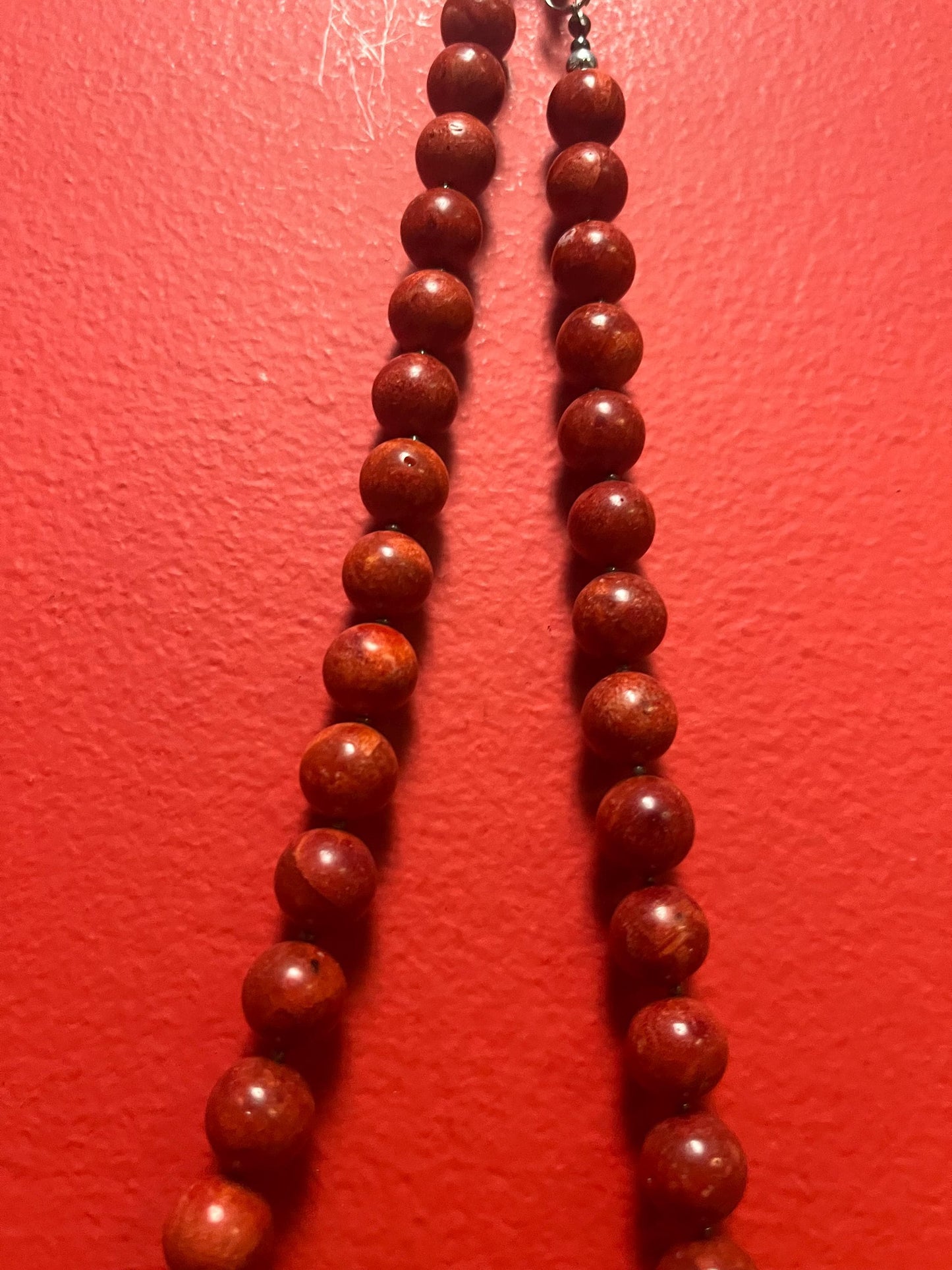 Beautiful approximately 20 inch long, red stone and silver plate pendant necklace  bright and beautiful