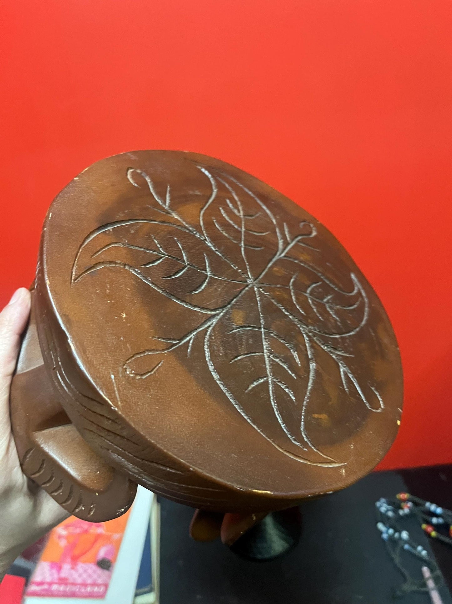 Very cool African 8 x 8” stool with legs the shape of yaks — great conversation piece and great value