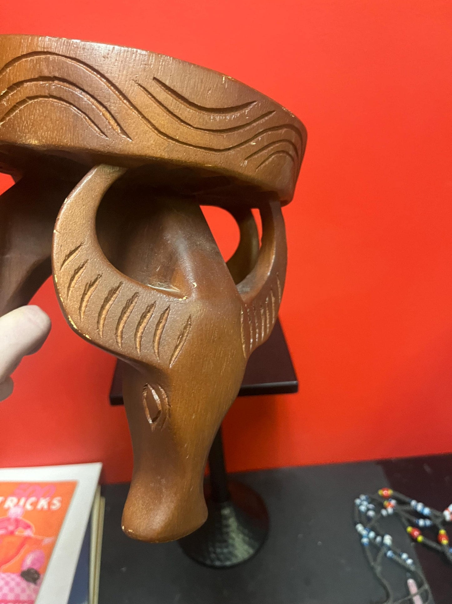 Very cool African 8 x 8” stool with legs the shape of yaks — great conversation piece and great value