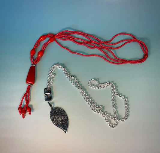 Lot of 2 Necklaces  Red Beaded 24 inch with 4.5 inch Pendant & Silver Leaf 32 inch with 4 inch Pendant