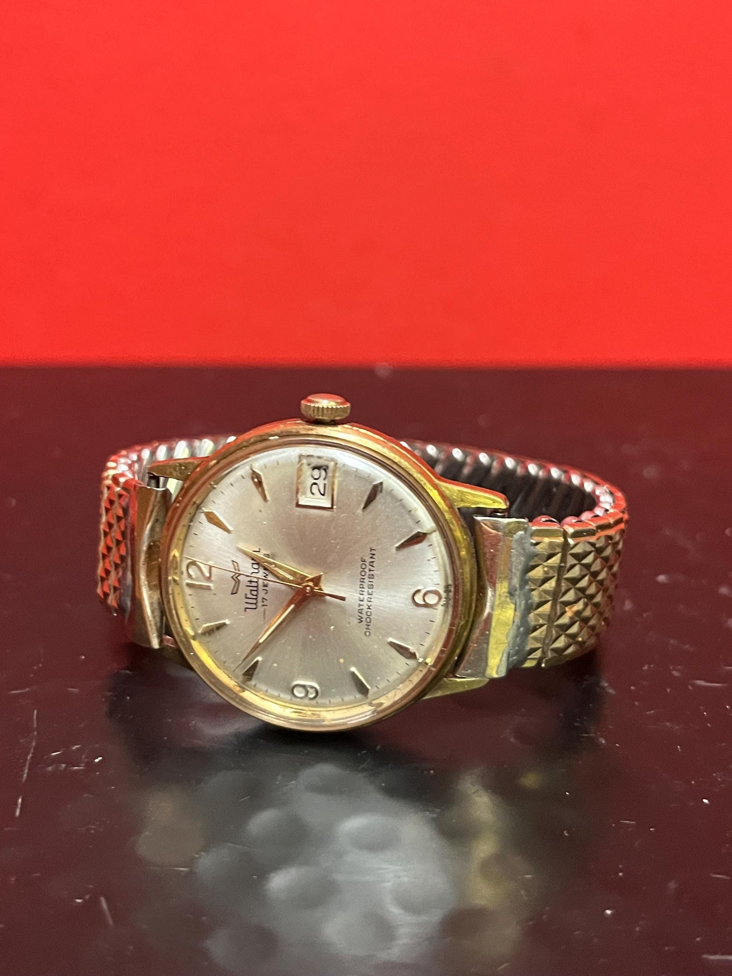 Lovely vintage WALTHAN gold coloured watch with expandible band  doesnt work well so as is  good project and great value