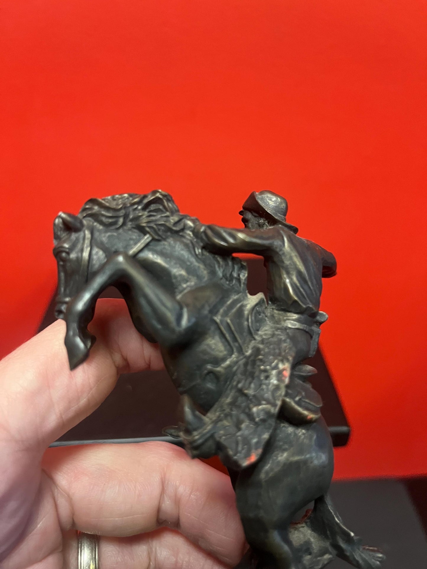 Lovely 5 inch high vintage Remington style bronze statue of a cowboy on horse on wood base great value and great gift