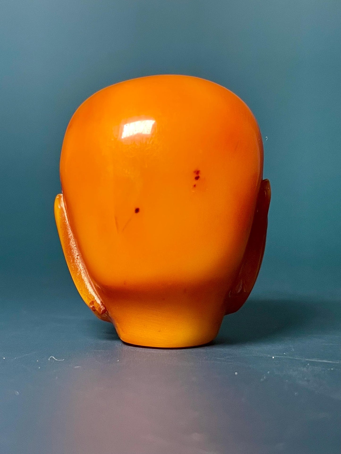 Amber Carved Arhat Head 2 inches high, Intricate Buddhist Art