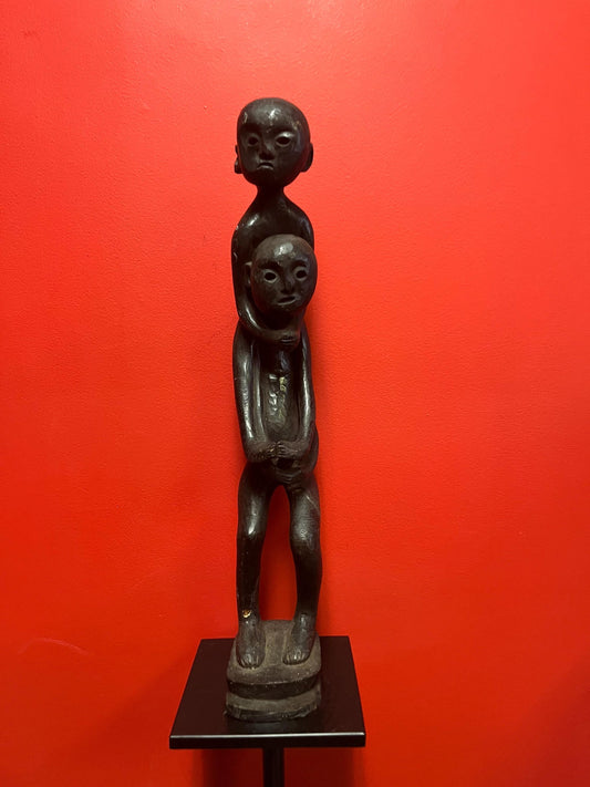 Stunning antique Indonesian teak statue of a musical player with mice  powerful imagery and 29 inches tall  some age cracks see photos