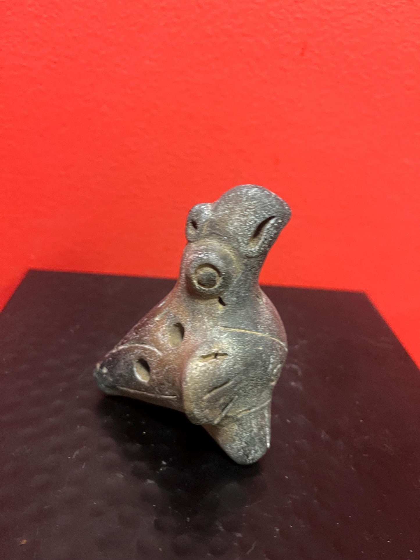 4 inch long Colombian Clay figural  whistle   nice sound   good condition