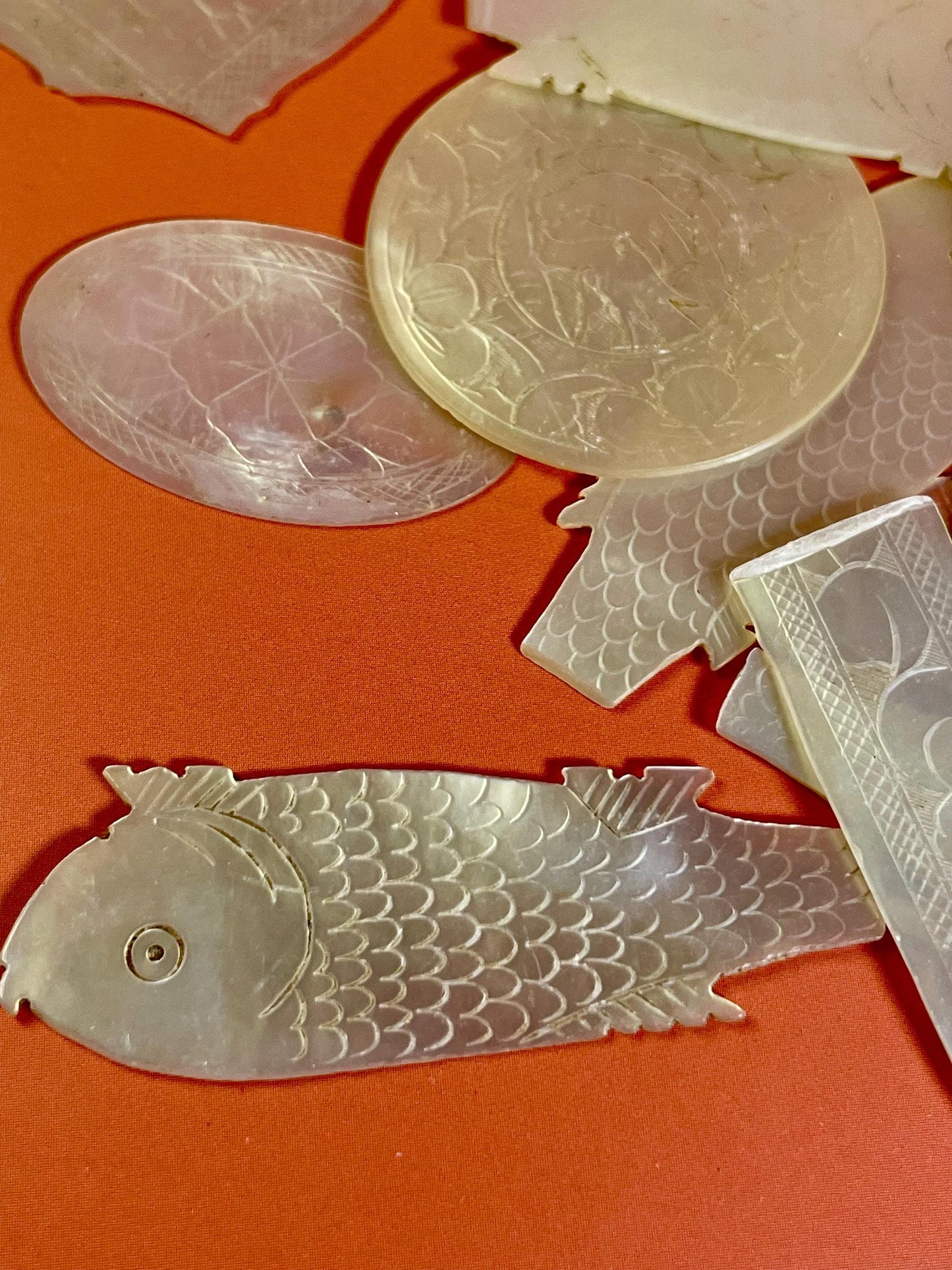 Assorted lot of mother of pearl chips. Approx 1.5 inches