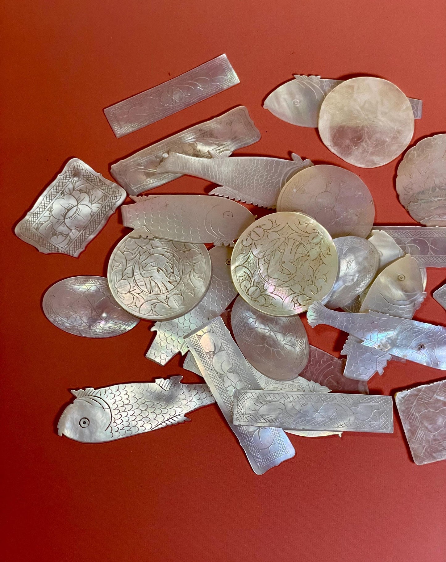 Assorted lot of mother of pearl chips. Approx 1.5 inches
